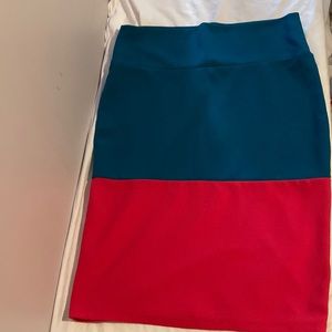 Lularoe “Cassie” pencil skirt size L.  Never worn.  Hot pink and teal green